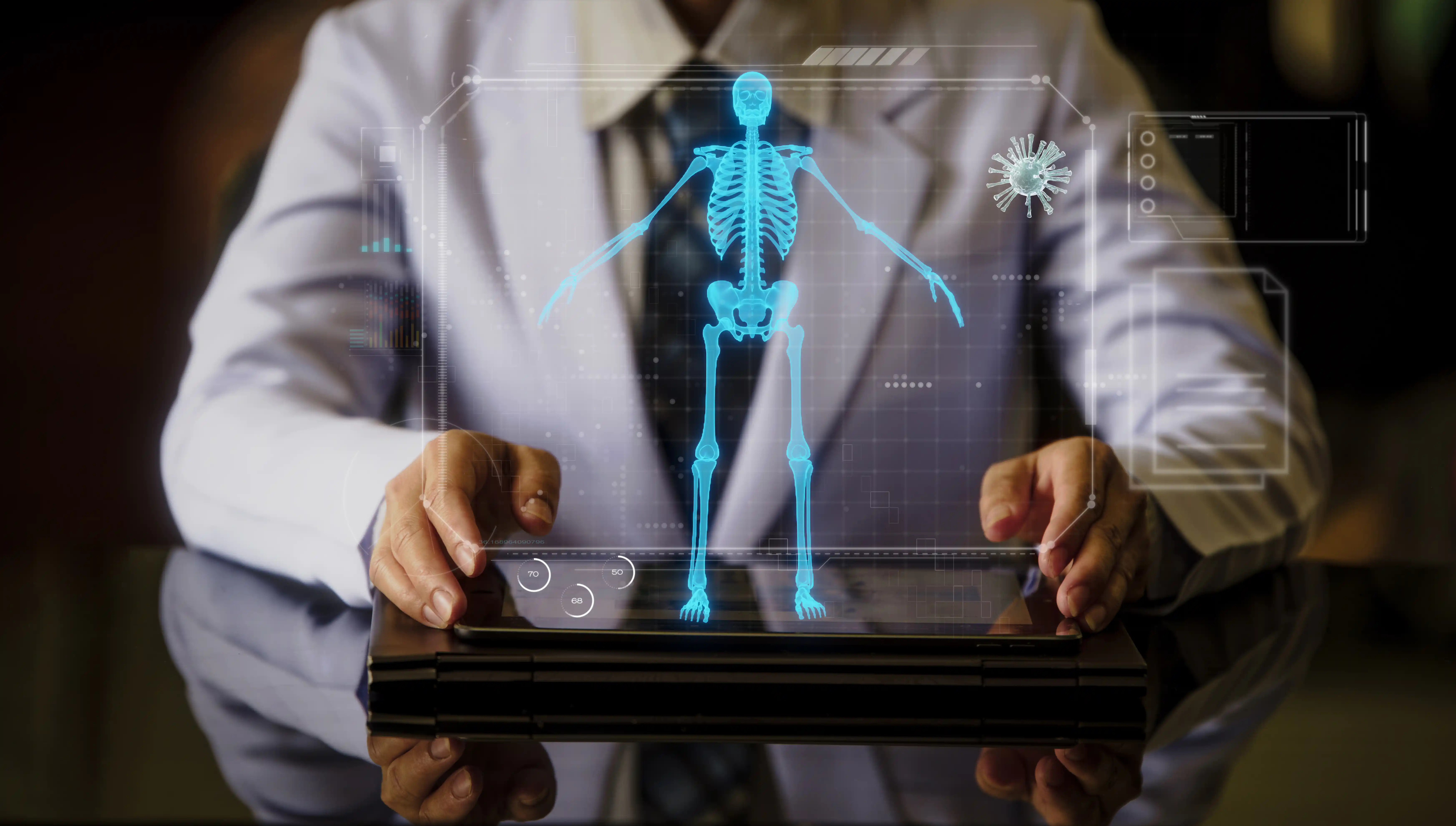 Dr. Rohit Prasad Varkey demonstrating advanced orthopedic technology